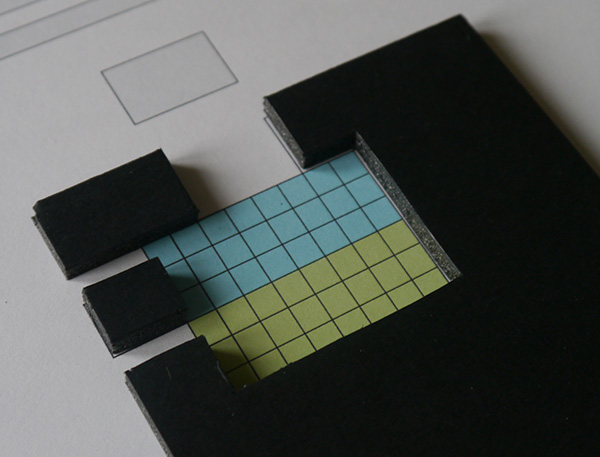 Foam-board pieces in position over the printed template